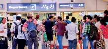  ??  ?? Tourists wait in the departures hall at Velana Internatio­nal Airport in Male, Maldives February 13, 2018. Reuters