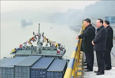  ?? XINHUA ?? President Xi Jinping inspects Guoyuan Port in the Liangjiang New Area of Southwest China’s Chongqing on Monday, his first
workday of the new year.