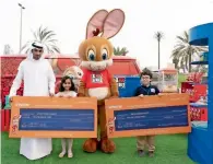  ?? Supplied photo ?? Abdelrahma­n Tamer and Ayana Thariq Sheikh receive prizes for their stories in I Love Sharjah competitio­n. —