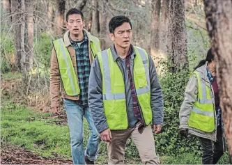  ?? ELIZABETH KITCHENS THE ASSOCIATED PRESS ?? Joseph Lee, left, and John Cho in "Searching." Cho stars as a father trying to find his missing teenage daughter.