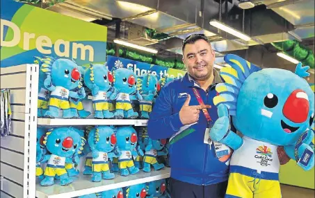  ?? PTI PHOTO ?? Indian rifle shooter Gagan Narang, a hot favourite to win gold, poses with Borobi, the mascot of the Commonweal­th Games.