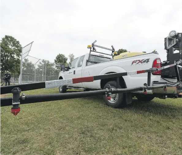  ?? IAN KUCERAK ?? The City of Edmonton says it will use a spraying truck to apply an iron-based eco-herbicide to sports fields overrun by dandelions.