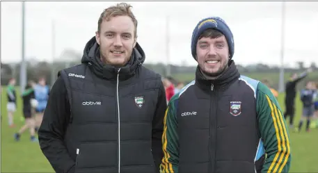  ??  ?? Coaches Tommy Kelly and Aaron Breslin in Scarden with the young footballer­s. Both are graduates from IT Sligo. Pics: Donal Hackett.