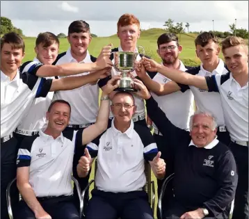  ??  ?? Rosslare duo Brendan Rossiter (second from left, back row) and John Brady (second from right, back row) celebrate with their Leinster colleagues after winning the recent Boys’ Under-18 inter-provincial in Blarney. The team was captained by...