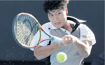  ?? EPA ?? Thailand’s Luksika Kumkhum in action against Johanna Larsson of Sweden in the first round of the Australian Open yesterday.