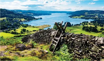  ??  ?? NEVER OUT OF STILE: Windermere stretches out below Loughrigg Fell. Left: New vessel MV Swift