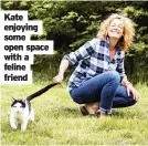  ??  ?? Kate enjoying some open space with a feline friend