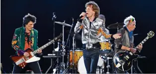  ?? KEY ?? Morgen in Zürich: Mick Jagger (M.) und seine Mitstreite­r beim Konzert in Hamburg.