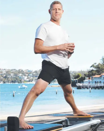  ?? Picture: Richard Dobson ?? Gold Coast surfer Mick Fanning is the face of FS8, a new fitness studio from the team behind F45.