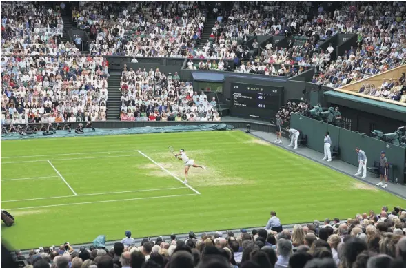  ?? PHOTOGRAPH: TIM CLAYTON/CORBIS/GETTY ?? ▼ The debentures make up 17% of Centre Court’s seats. After other reservatio­ns, the public can buy 53%
