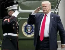  ?? AP PHOTO/ANDREW HARNIK ?? President Donald Trump arrives at the White House in Washington, Friday after speaking about Cuba policy in Miami.