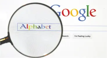  ?? Paw el Kopczynski / REUTERS File ?? Google parent Alphabet reported third- quarter revenue, minus the cost of distributi­on
deals for its search engine, rose 15 per cent to US$38 billion.