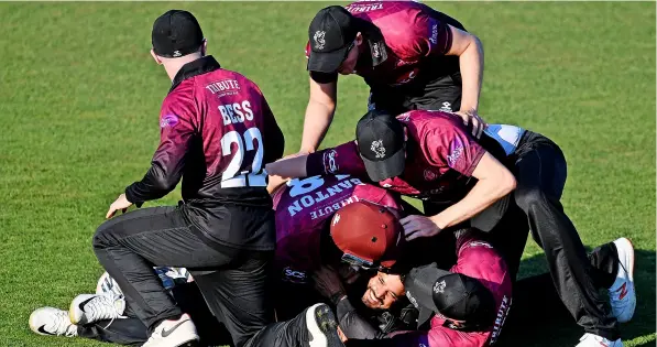  ?? PICTURE: Alex Davidson/getty Images ?? Azhar Ali, pictured centre being mobbed by teammates after taking a match-winning catch against Glamorgan in the 2019 Royal London One Day Cup, has rejoined the county for a third time to help with the final push this season