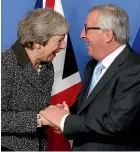  ?? AP ?? British Prime Minister Theresa May is greeted by European Commission President Jean-Claude Juncker in Brussels, during May’s whistlesto­p tour of Europe to try to save her Brexit deal.