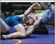  ?? STAN HUDY/THE SARATOGIAN ?? Columbia wrestler Michael Altomer has Ballston Spa’s Darrien Insogna headed towards his back and near fall points Wednesday night in Suburban Council action at Ballston Spa High School.