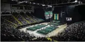  ?? ERIN PENCE / WRIGHT STATE UNIVERSITY. ?? Graduates and families attend a Wright State University graduation ceremony at the Nutter Center in December 2023.