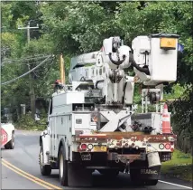  ?? Matthew Brown / Hearst Connecticu­t Media ?? An Eversource truck