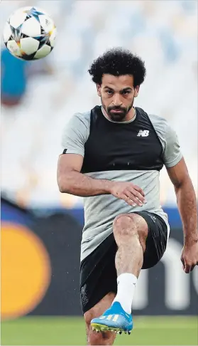  ?? MATTHIAS SCHRADER THE ASSOCIATED PRESS ?? Liverpool's Mohamed Salah poses a serious threat to the decade of dominance of the world player of the year award by Ronaldo and Barcelona’s Lionel Messi.