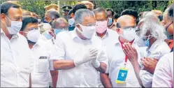  ?? AP ?? CM Pinarayi Vijayan (centre) greets leaders and supporters as he arrives at a vote-counting centre following the Left Democratic Front’s victory in Kannur, Kerala, on Sunday.