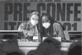  ?? CLAUDIO FURLAN/AP ?? Climate activists Greta Thunberg, left, of Sweden and Vanessa Nakate of Uganda attend a youth climate summit Tuesday in Milan, Italy.