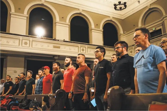  ?? Mason Trinca / Special to The Chronicle ?? The San Francisco Gay Men’s Chorus rehearses “Unbreakabl­e,” a musical work that explores 120 years of the history of LGBT people, composed by and starring Andrew Lippa.