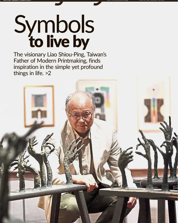  ?? — KAMARUL ARIFFIN/The Star ?? Liao posing with his installati­on work Pray (paper pulp on long benches, 2008) at the National Art Gallery in Kuala Lumpur.