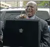  ?? Picture: REUTERS ?? CLEANING UP: Zimbabwean Finance Minister Patrick Chinamasa, before presenting his budget