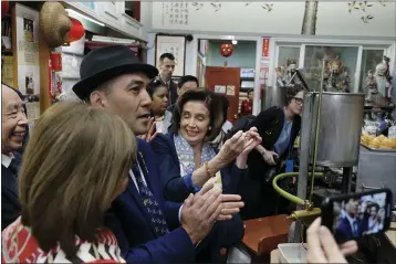  ?? ERIC RISBERG — THE ASSOCIATED PRESS ?? Speaker of the House Nancy Pelosi tours Chinatown in San Francisco on Monday to support local businesses amid the coronaviru­s crisis.