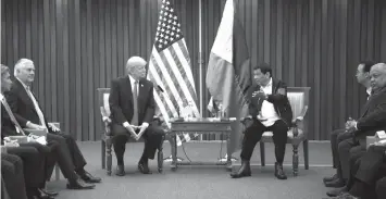  ?? AGENCE FRANCE PRESSE ?? US President Donald Trump listens to President Rodrigo Duterte during their bilateral meeting on the side line of the 31st Associatio­n of South East Asian Nations (ASEAN) Summit in Manila.