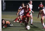  ?? RECORDER PHOTO BY CHIEKO HARA ?? Lindsay High School’s Evelyn Martinez chases down the ball Friday, Feb. 15, during the second half of the quarterfin­al match of a CIF Central Section Division V playoffs against Coalinga High Schoolat Frank Skadan Stadium.