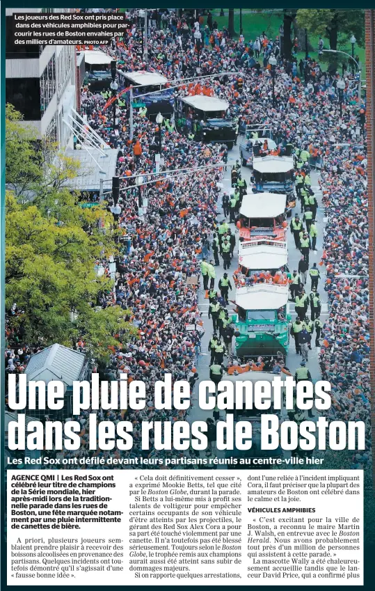  ??  ?? Les joueurs des Red Sox ont pris place dans des véhicules amphibies pour parcourir les rues de Boston envahies par des milliers d’amateurs.