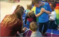  ?? EVAN BRANDT — DIGITAL FIRST MEDIA ?? Students in Lauren Emes’ Pre-K classroom at Franklin Elementary School get ready to visit the library following a lesson Tuesday morning.