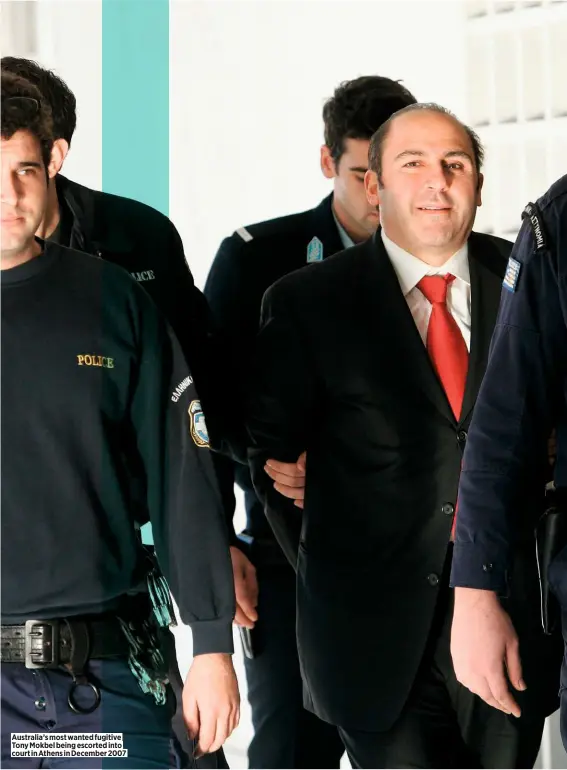  ??  ?? Australia’s most wanted fugitive Tony Mokbel being escorted into court in Athens in December 2007