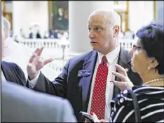  ?? BOB ANDRES / BANDRES@AJC.COM ?? Sen. Brandon Beach, R-Alpharetta, says he’ll try again in 2018 to get the casino bill passed. He talks with lobbyists about his plans.