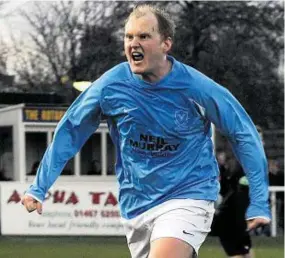  ??  ?? ALWAYS A WINNER: Mike Mckenzie with the Aberdeensh­ire Cup won by Vale last