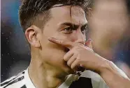 ?? Massimo Pinca/reuters ?? O atacante argentino Dybala, da Juventus, comemora seu gol anotado contra o Cagliari