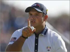  ?? ALASTAIR GRANT - THE ASSOCIATED PRESS ?? Patrick Reed of the US gestures after sinking a putt on the 9th hole during a fourball match on the second day of the 42nd Ryder Cup at Le Golf National in Saint-Quentin-enYvelines, outside Paris, France, Saturday, Sept. 29, 2018.