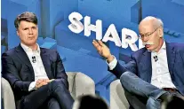  ??  ?? The CEO of German auto giant Daimler AG Dieter Zetsche (R) and CEO of German carmaker BMW Harald Krueger presenting the merger of their car sharing activities in Berlin