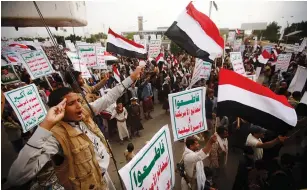  ?? (Mohamed al-Sayaghi/Reuters) ?? HOUTHI PROTESTERS rally outside Sanaa Airport denouncing a blockade imposed by the Saudiled coalition.