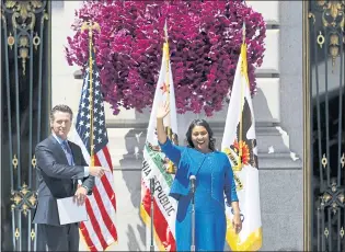  ?? ASSOCIATED PRESS ?? California Lt. Gov. Gavin Newsom, left, introduces London Breed as San Francisco’s new mayor after she was sworn in Wednesday outside City Hall.