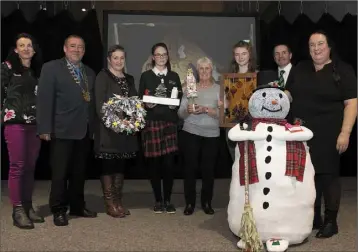  ??  ?? Adult and Family Winners: Cliona Connolly, Cllr Keith Doyle, Anne Marie Toomey (Christmas Wreath), Lauren Spencer (Christmas Wonderland), Ellie Walsh (My Scented Christmas Tree) Sinéad Ryan (Christmas Stainglass Delight), Cllr John Hegarty, Evelyn Duggan (Frosty The Snowman and Friend).