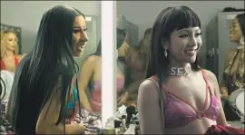  ?? STXfilms ?? CARDI B, left, and Constance Wu play strippers in Lorene Scafaria’s “Hustlers.”