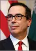  ??  ?? Pruitt, Mnuchin: Coach is for the rabble.