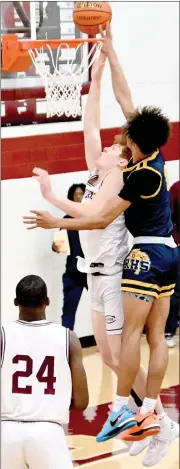  ?? PILOT PHOTO/RON HARAMIA ?? CMA’S Cooper Farrall gets this shot blocked by South Bend Riley’s Payton Baird.