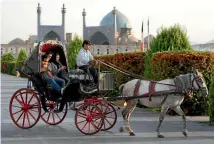  ?? ISTOCK ?? Enjoy a carriage ride around Esfahan’s Naqsh-e Jahan (Imam) Square, home to the most majestic collection of buildings in the Islamic world.