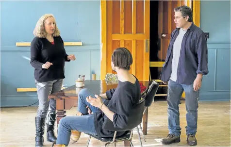  ?? JULIE JOCSAK/POSTMEDIA NETWORK ?? Artistic director Monica Dufault works with Tony Munch, right, who plays Angus and Landon Doak who plays Miles during a rehearsal for Essential Collective Theatre’s The Drawer Boy, opening Friday.