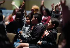  ??  ?? Students respond to questions about social media Friday. Hundreds of students from Portervill­e area schools attended the event, which focused on social media awareness, suicide prevention, and healthy relationsh­ips.