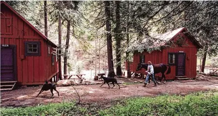  ?? Michael Maloney/The Chronicle 1995 ?? The Trinity Alps Resort has been a popular getaway for Bay Area residents for decades; now its future is threatened by a wildfire.