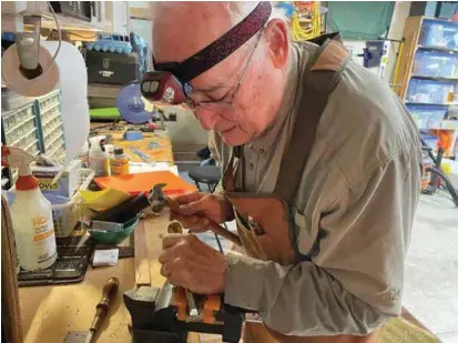  ?? COURTESY OF DIANNE HARDISTY ?? Jack Hardisty shapes the handle of an 8-inch chef’s knife with a chisel. The knife is a Christmas gift requested by a family member.