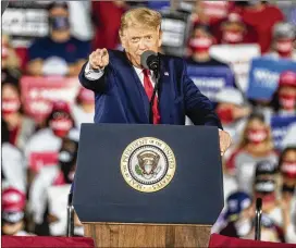  ?? ALYSSA POINTER/ALYSSA.POINTER@AJC.COM ?? President Donald Trumpspeak­s at a rally Oct. 16 atMiddle Georgia RegionalAi­rport in Macon. Once an afterthoug­ht in presidenti­al races, Georgia is in the national spotlight this year with 16 electoral votes at stake.